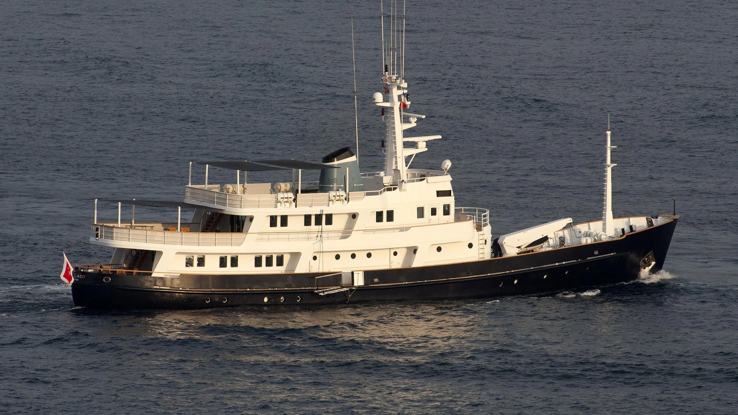 a large ship in the water aboard ICE LADY Yacht for Sale