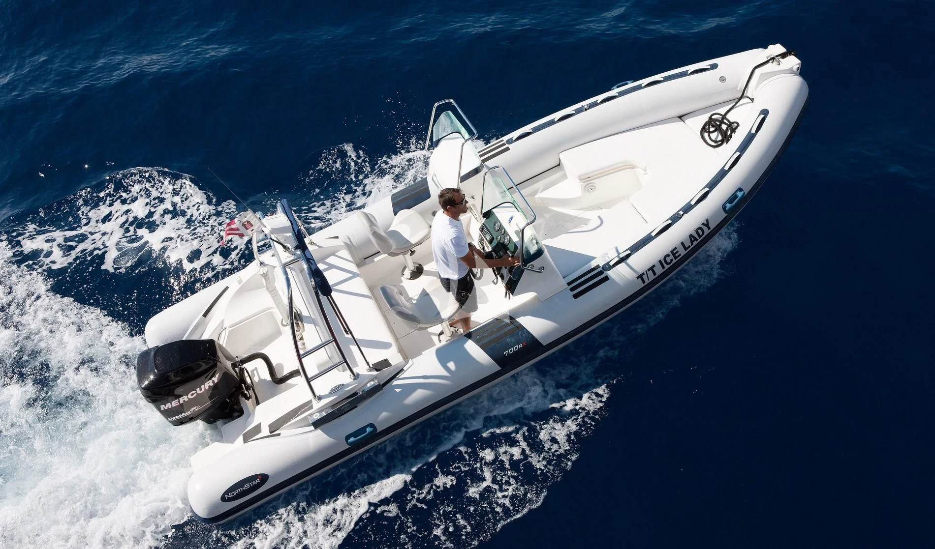 a person on a boat aboard ICE LADY Yacht for Sale