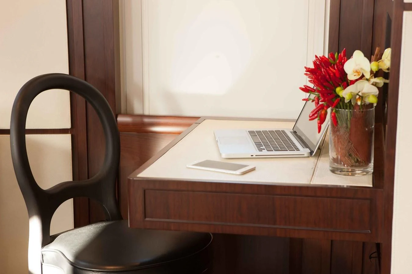 a laptop on a desk aboard ICE LADY Yacht for Sale
