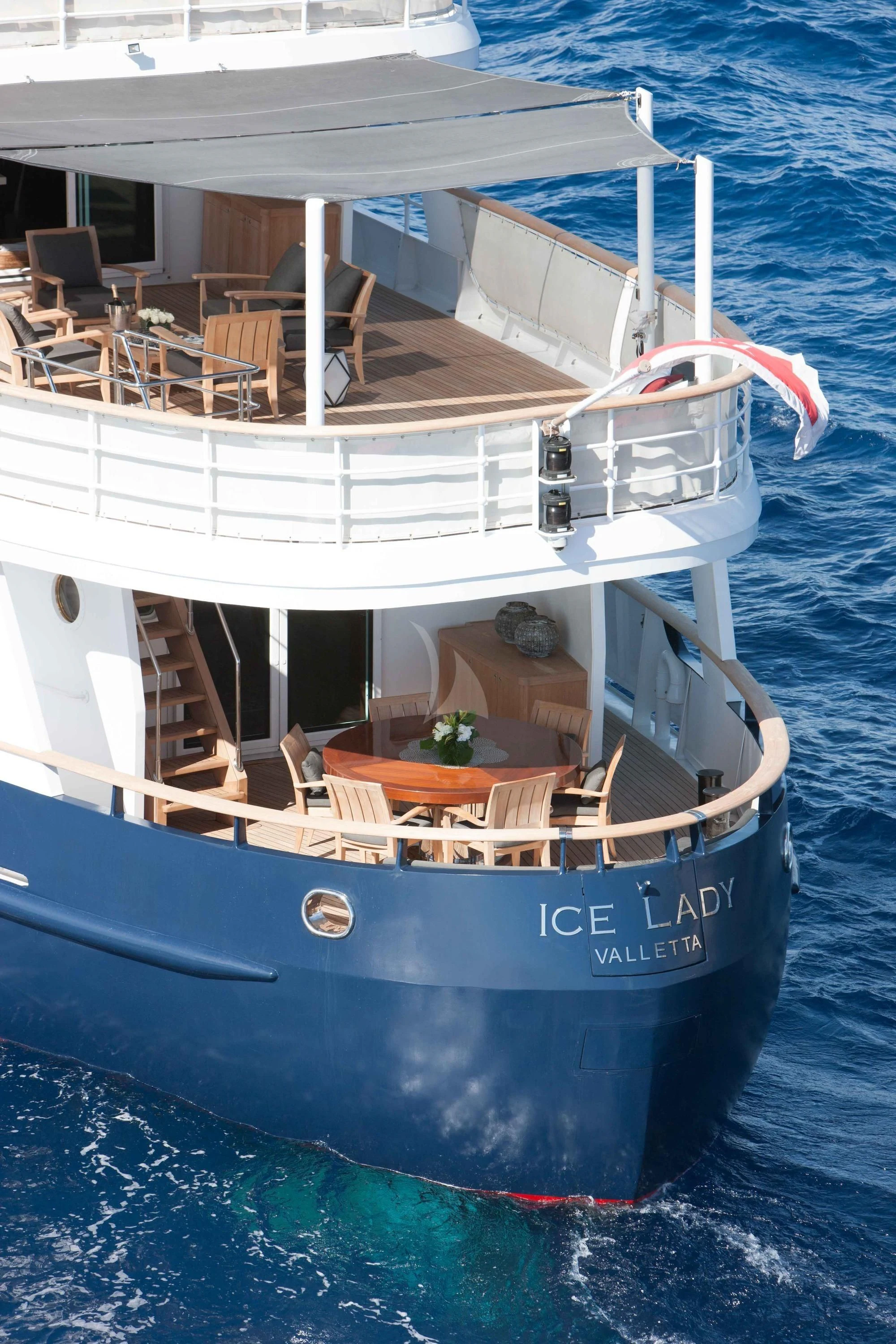 a boat with a ladder on the deck aboard ICE LADY Yacht for Sale