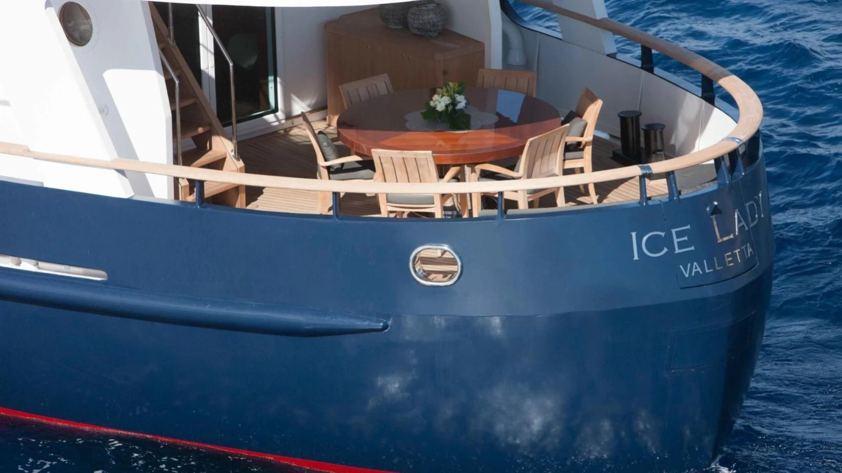 a pool table with chairs aboard ICE LADY Yacht for Sale