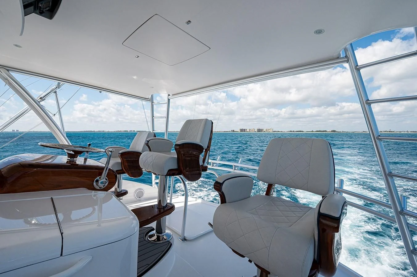 a boat with chairs and a table aboard SURFBUM Yacht for Sale