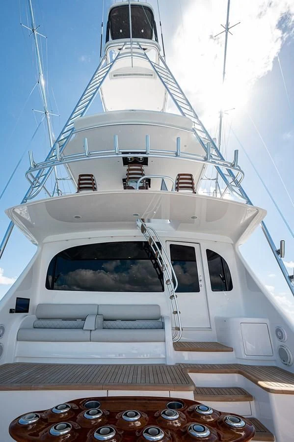 a white boat with a white ship aboard SURFBUM Yacht for Sale
