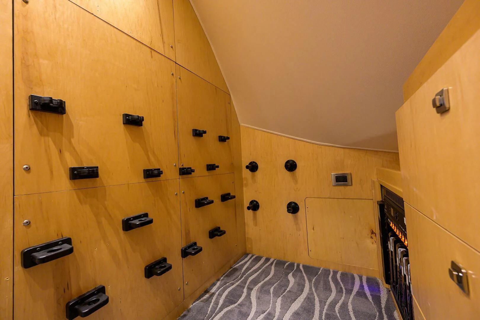 a bedroom with a bed and a closet aboard SURFBUM Yacht for Sale