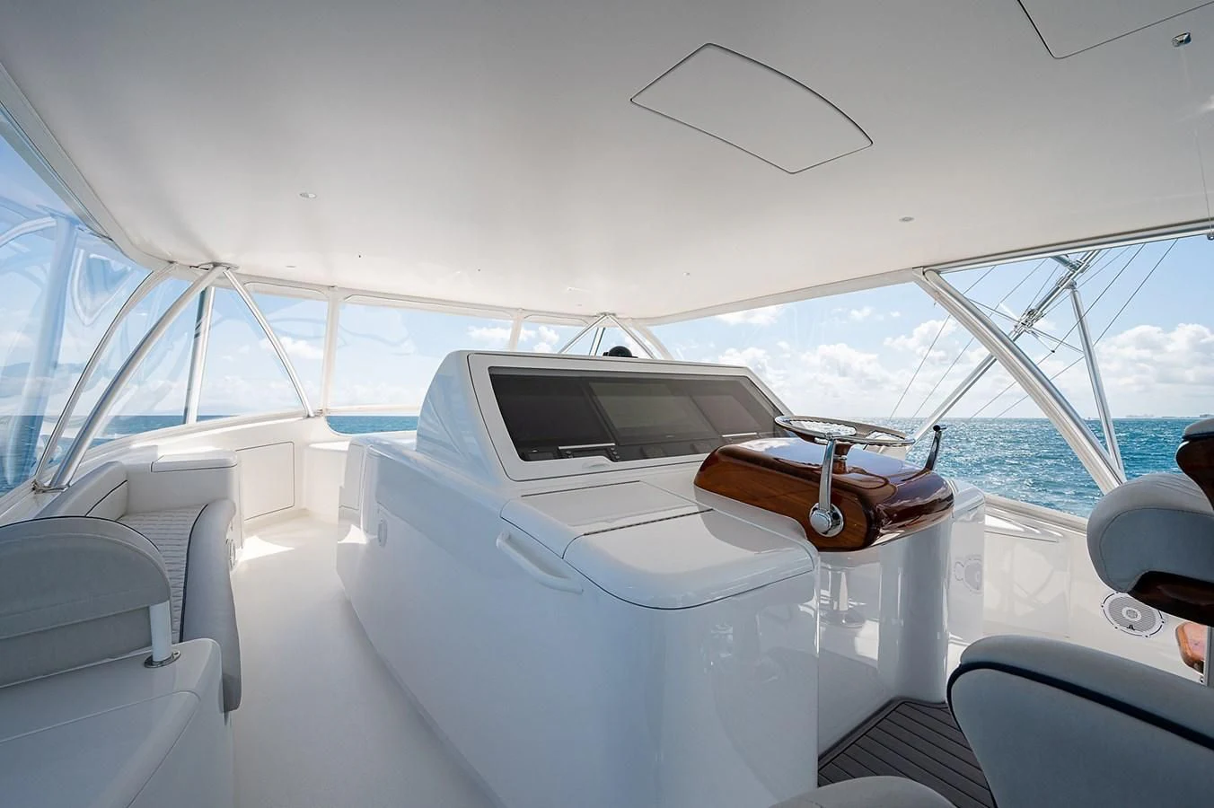 a boat with a steering wheel aboard SURFBUM Yacht for Sale