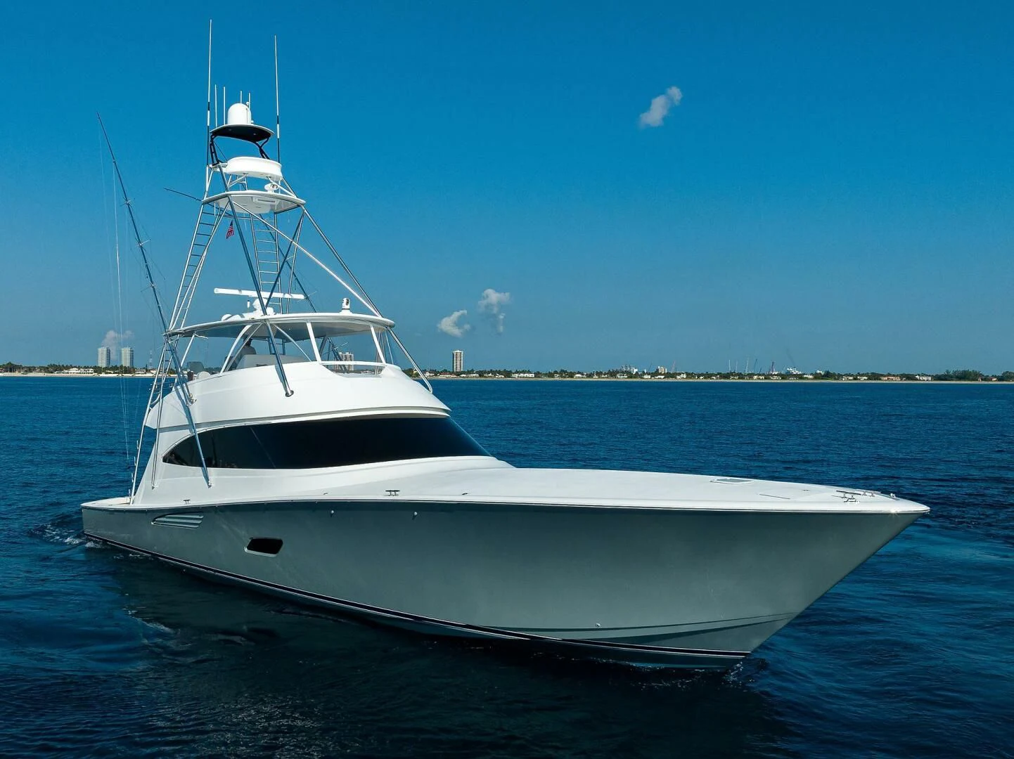 a white boat in the water aboard SURFBUM Yacht for Sale