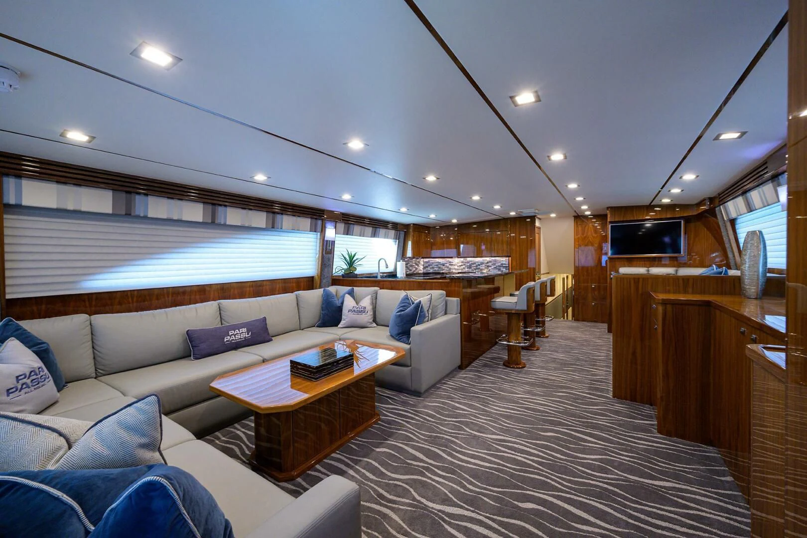 a large living room with a large bed and a large window aboard SURFBUM Yacht for Sale