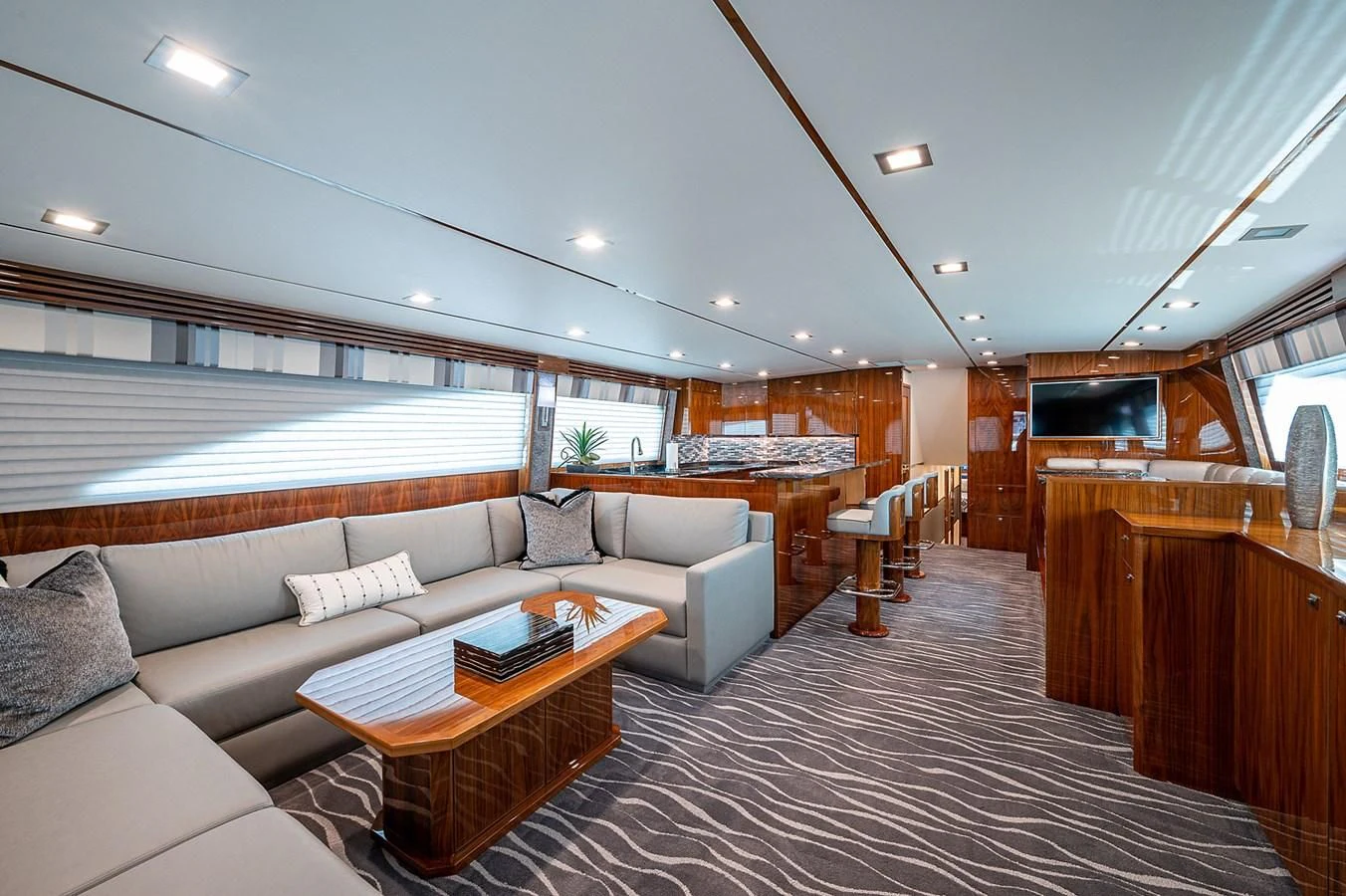 a living room with a couch and a coffee table aboard SURFBUM Yacht for Sale