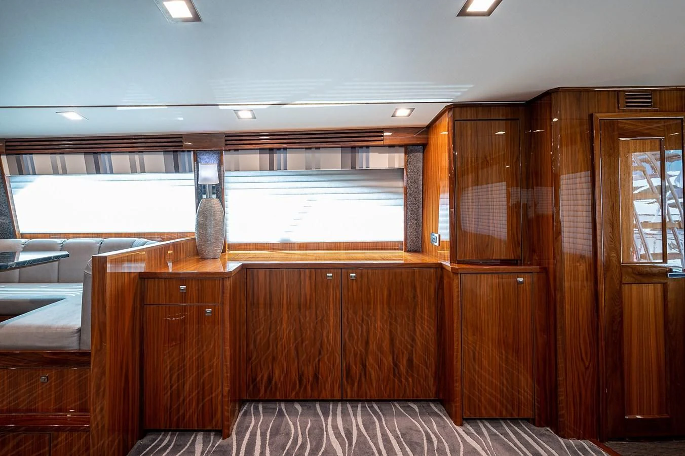a room with wooden cabinets and a wood wall aboard SURFBUM Yacht for Sale