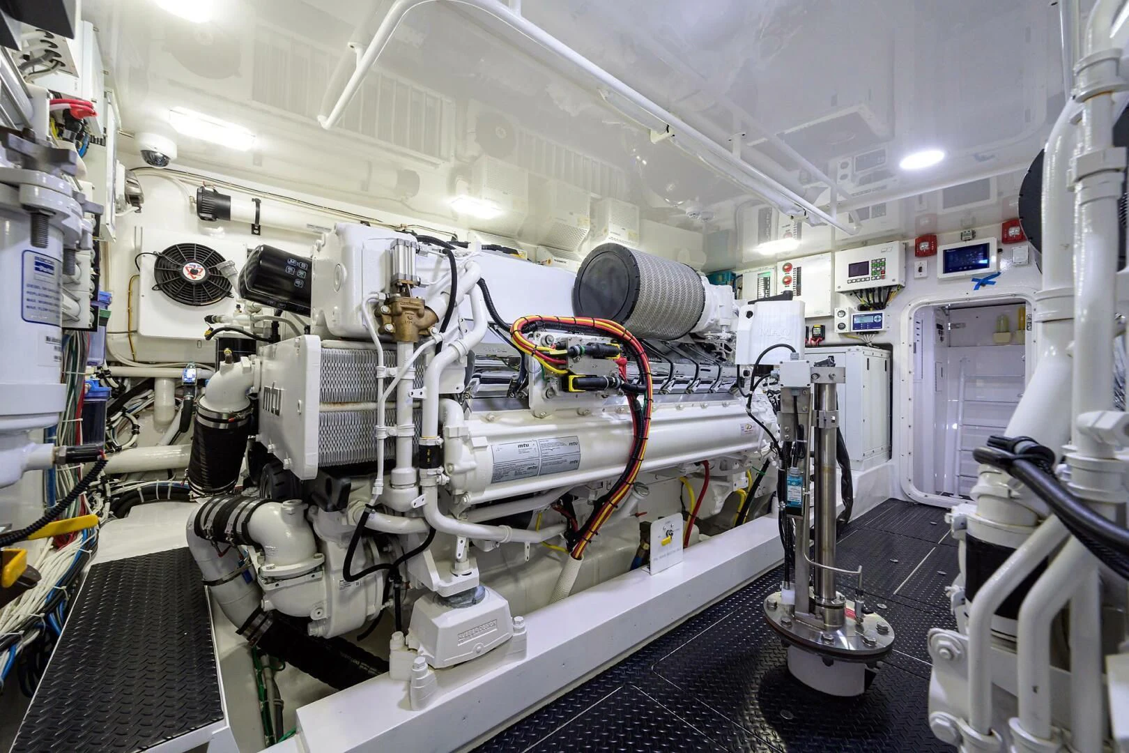 a large white machine aboard SURFBUM Yacht for Sale