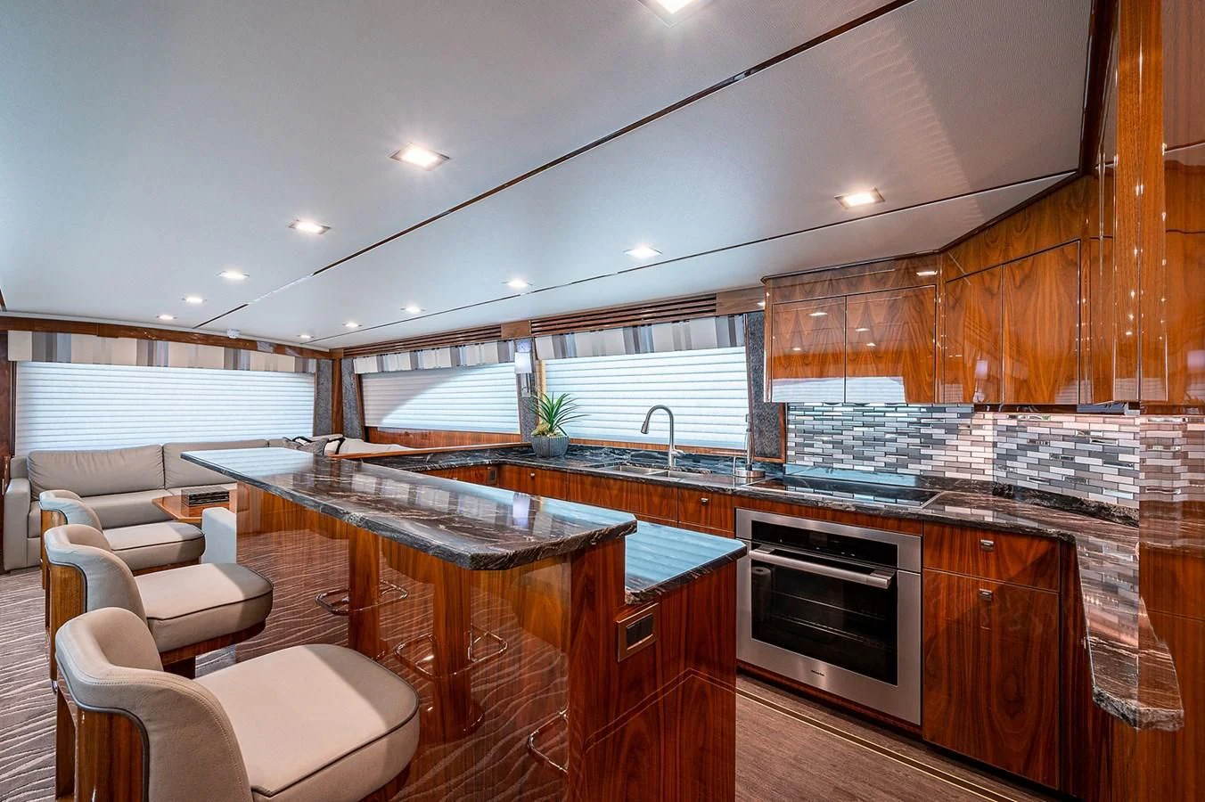 a kitchen with a large island aboard SURFBUM Yacht for Sale