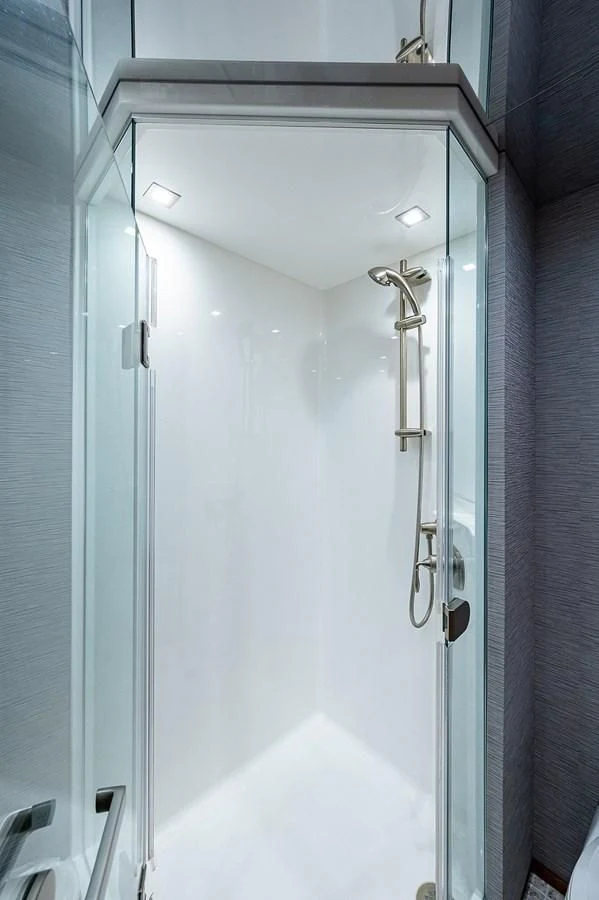 a white door with a handle aboard SURFBUM Yacht for Sale
