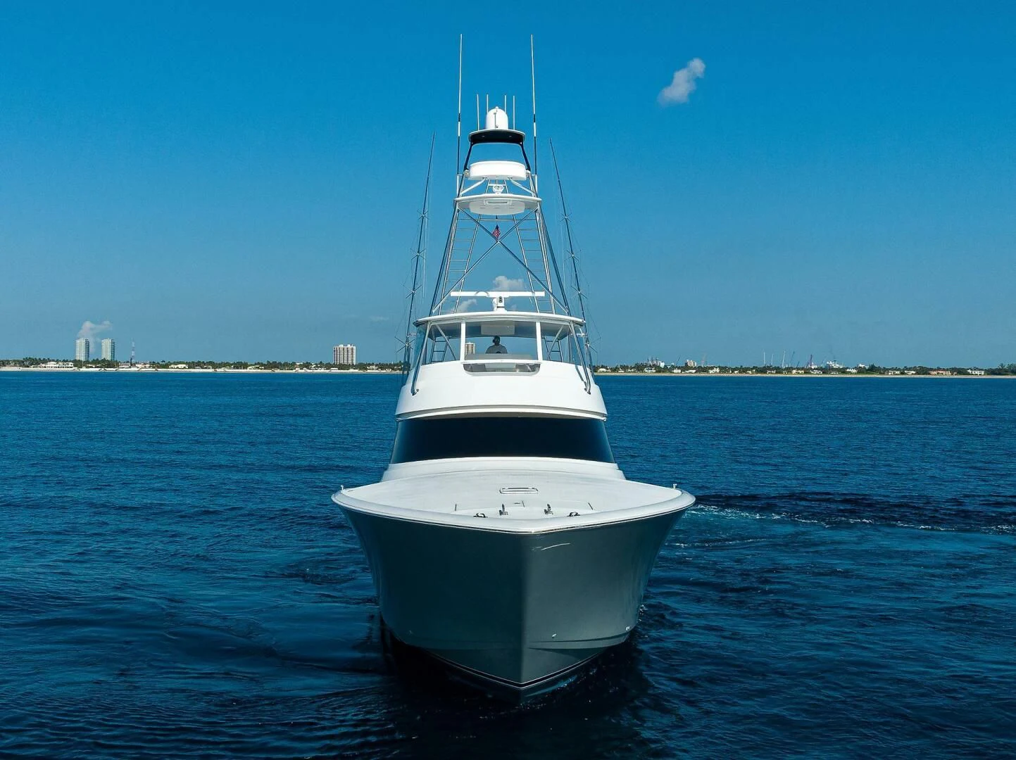 a white boat in the water aboard SURFBUM Yacht for Sale