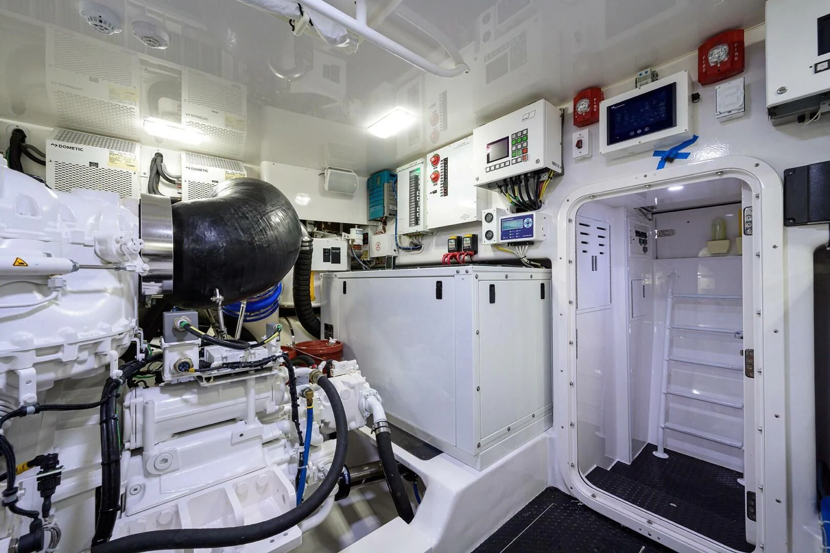 a room with a machine aboard SURFBUM Yacht for Sale