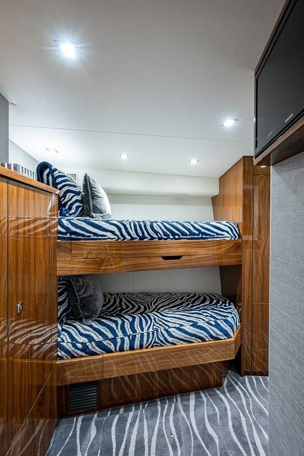 a bunk bed in a room aboard SURFBUM Yacht for Sale