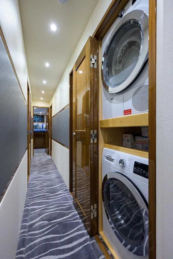 a hallway with a washing machine aboard SURFBUM Yacht for Sale