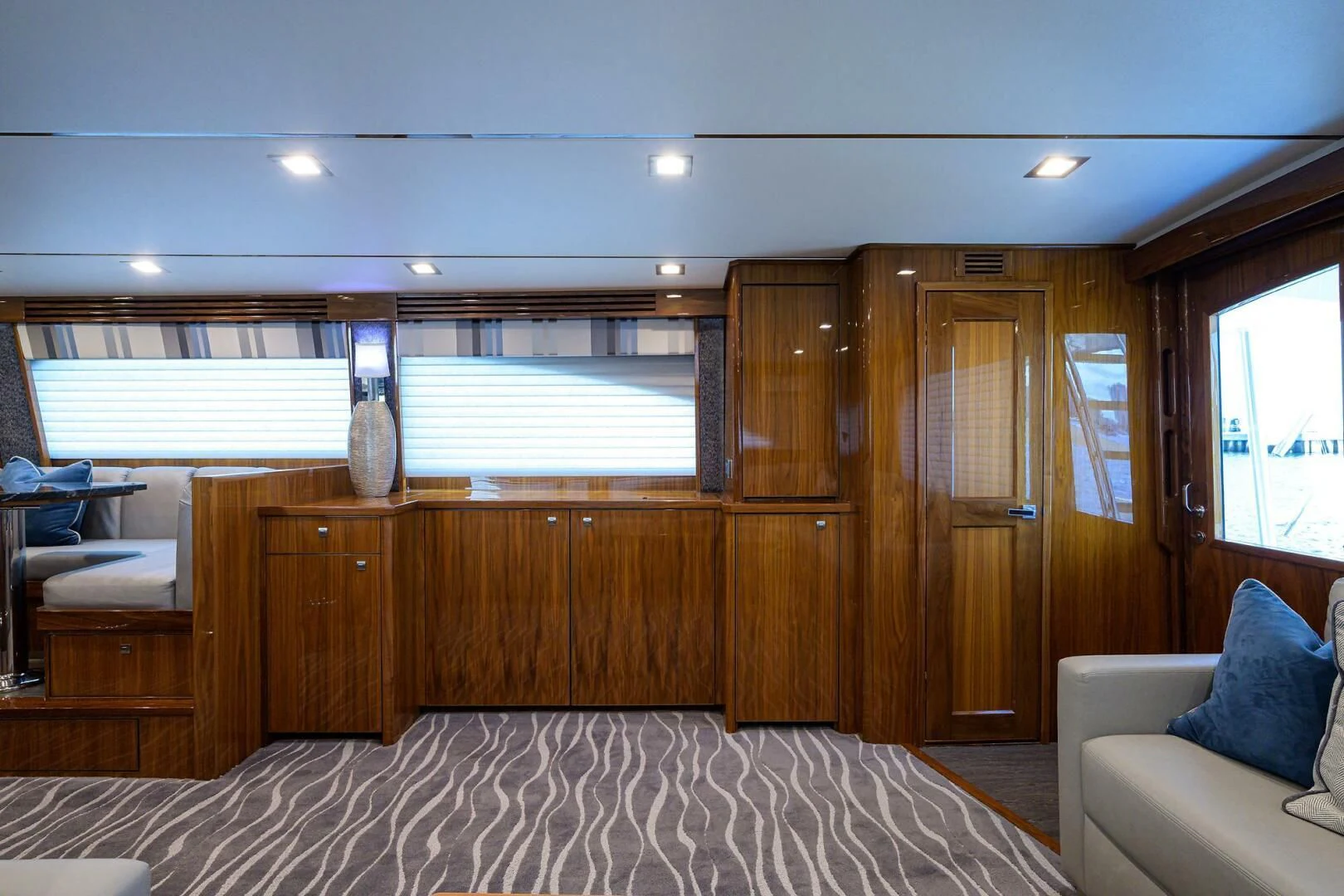a room with a bed and a couch aboard SURFBUM Yacht for Sale
