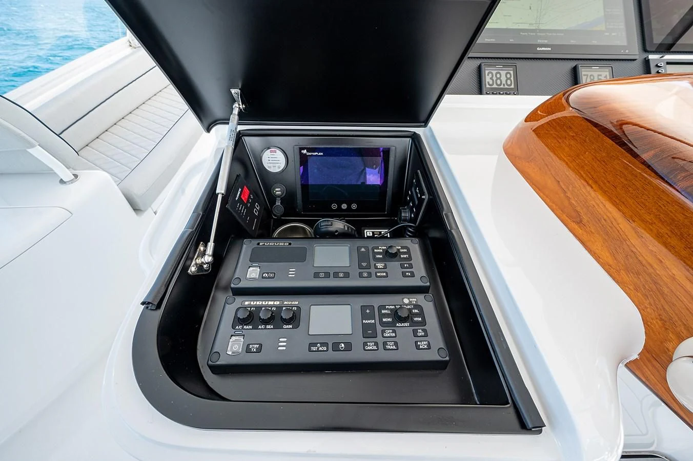 a close-up of a car stereo aboard SURFBUM Yacht for Sale