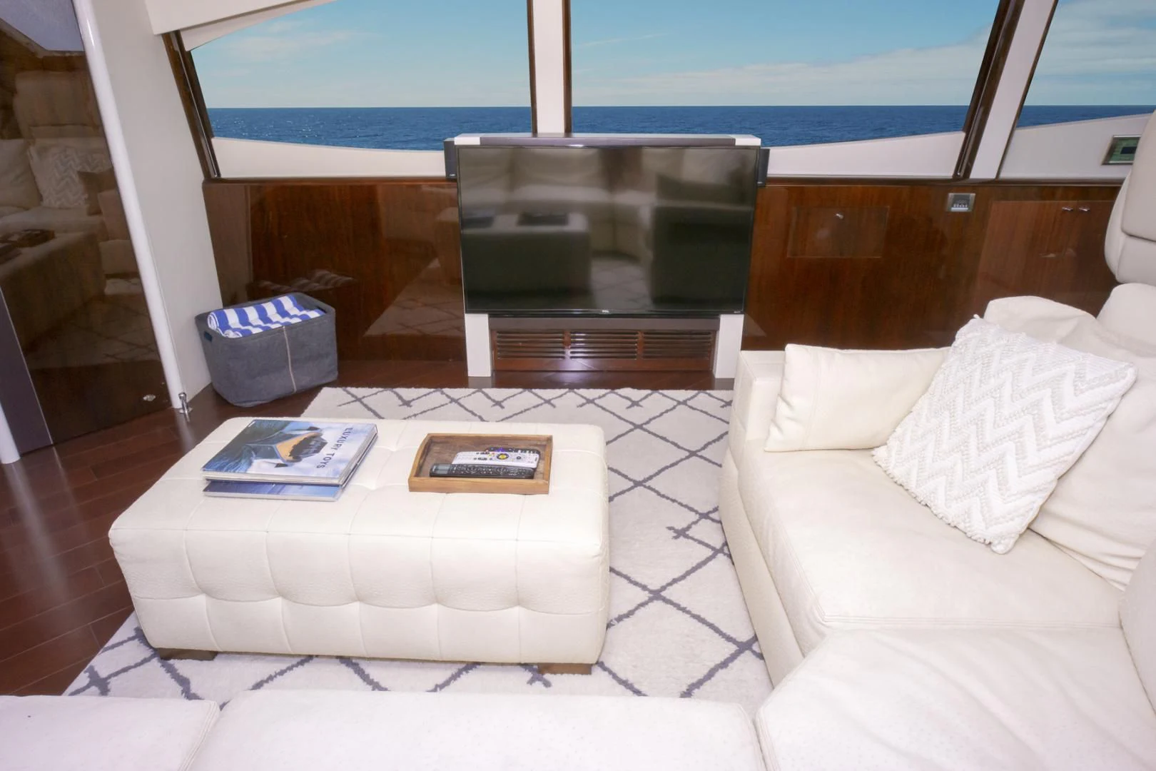 a room with a couch and a table aboard SALACIA Yacht for Sale