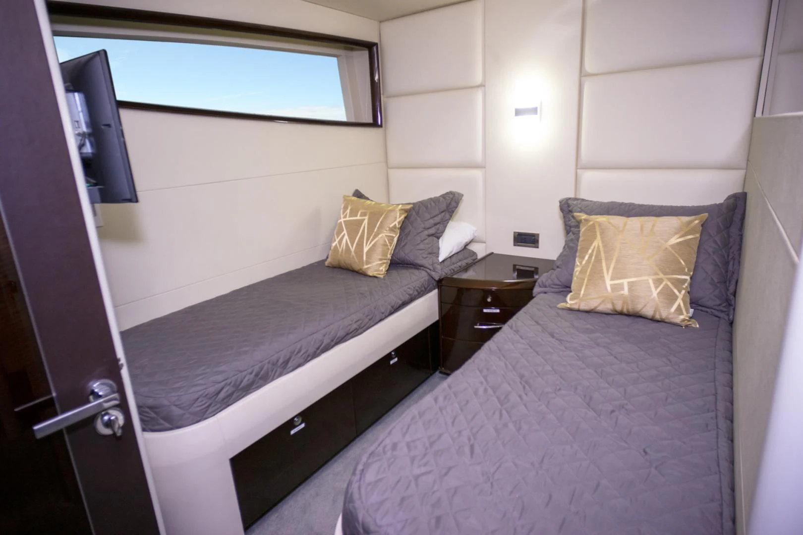 a couple of beds in a room aboard SALACIA Yacht for Sale