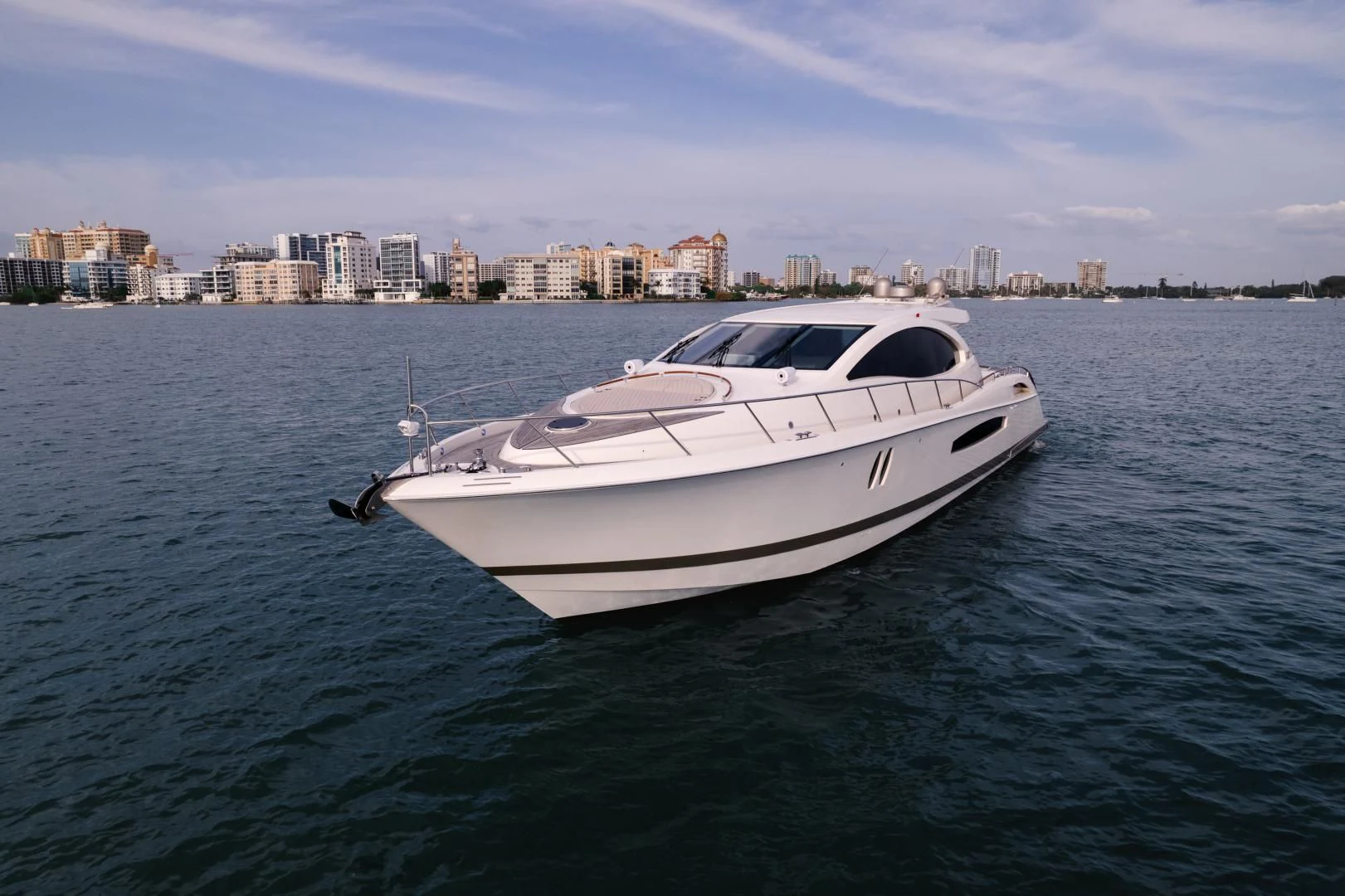 a white yacht in the water aboard SALACIA Yacht for Sale