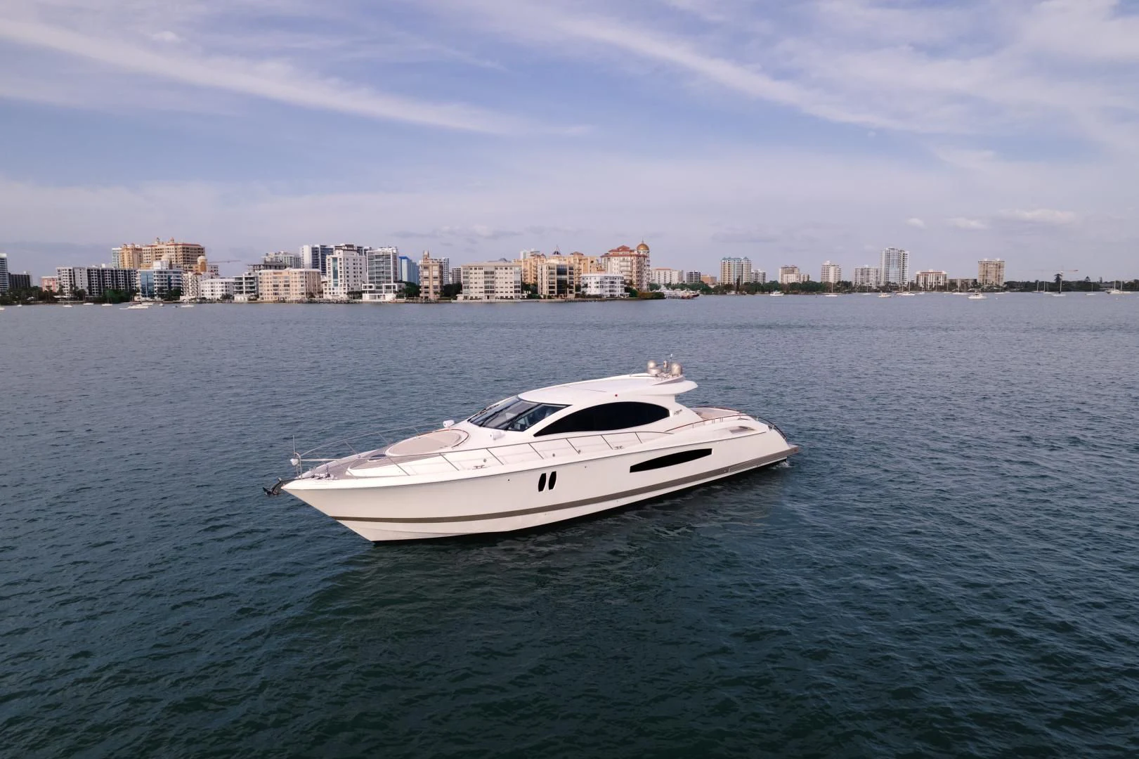 a white yacht in the water aboard SALACIA Yacht for Sale