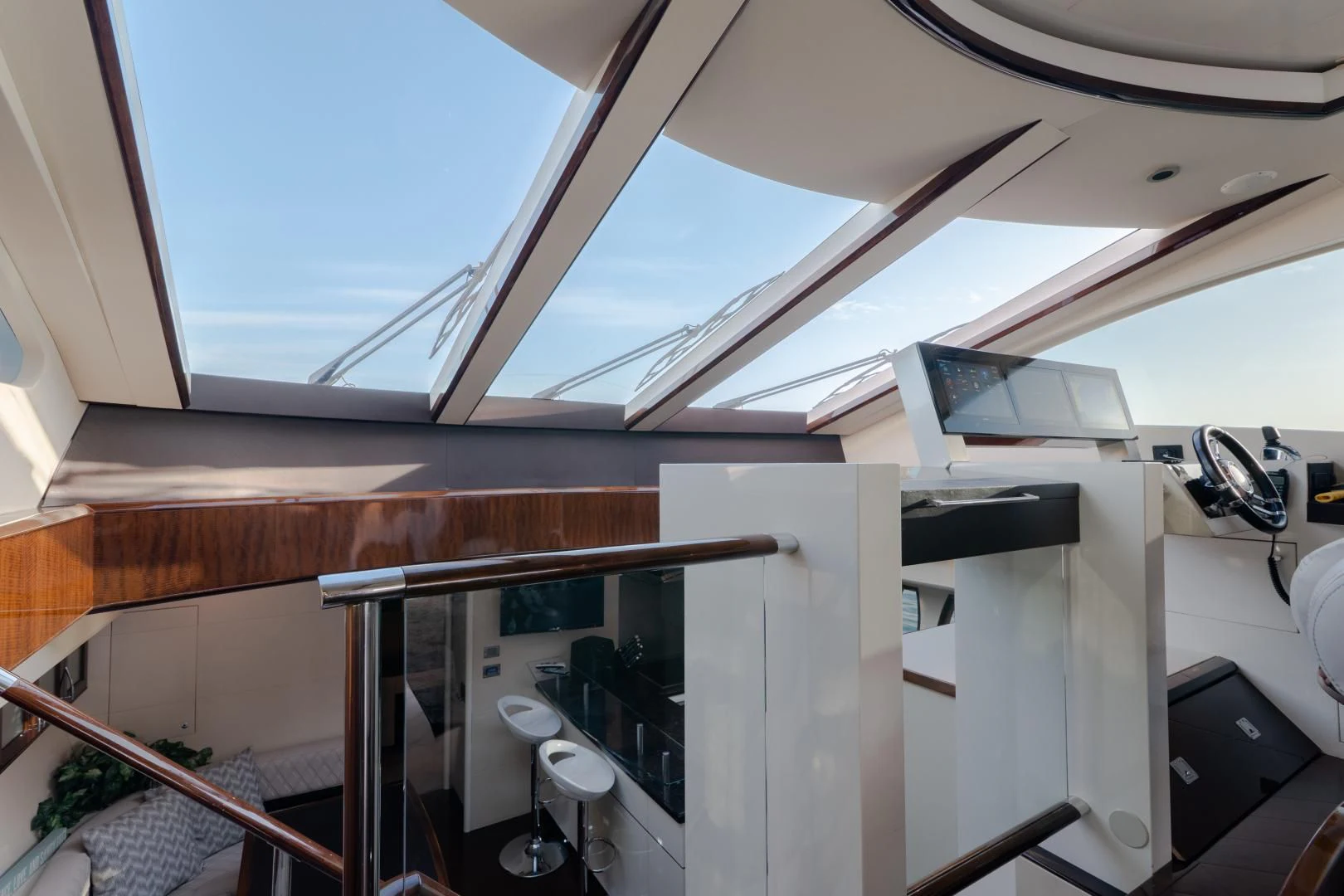 a room with a window and a view of the sky aboard SALACIA Yacht for Sale