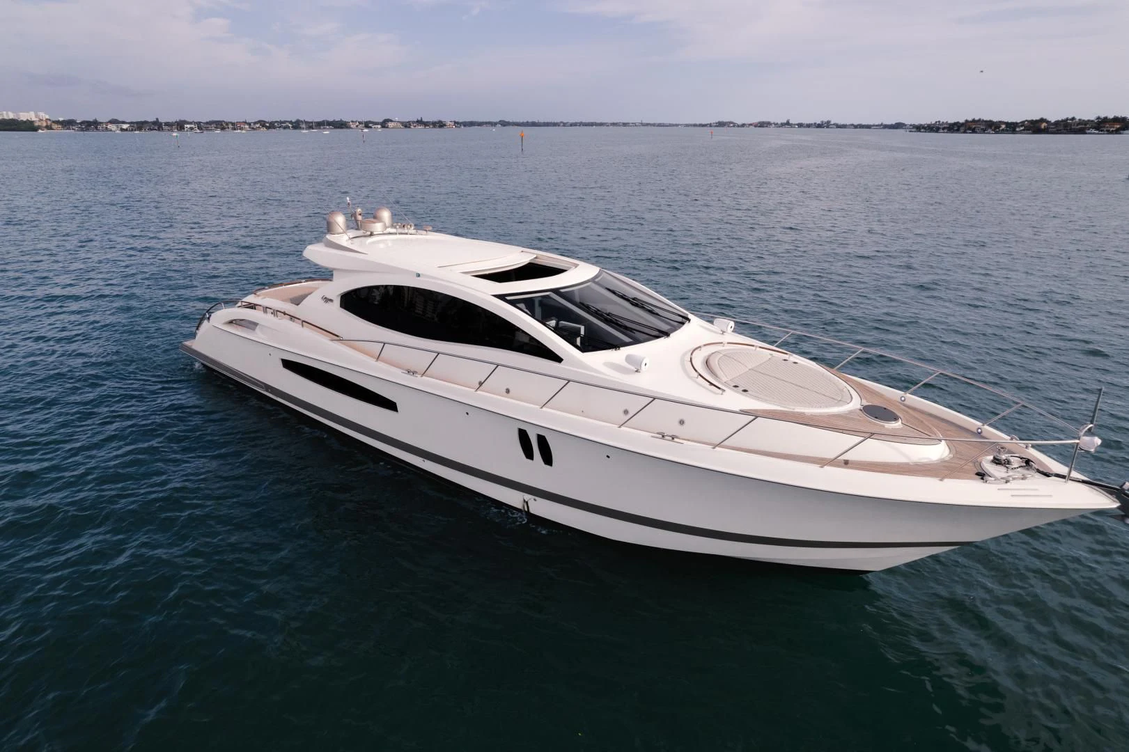 a white yacht in the water aboard SALACIA Yacht for Sale