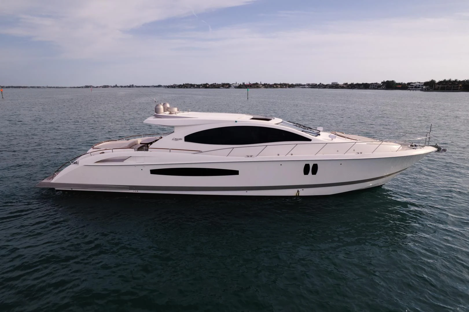 a white yacht in the water aboard SALACIA Yacht for Sale