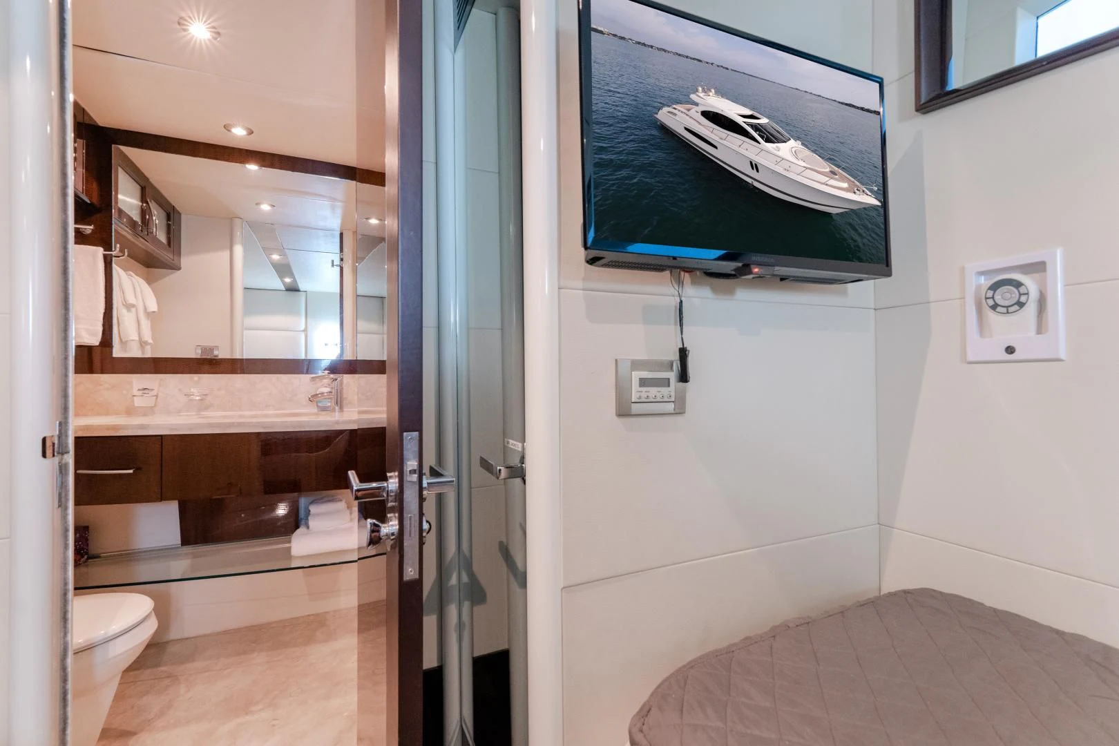 a bathroom with a large mirror aboard SALACIA Yacht for Sale