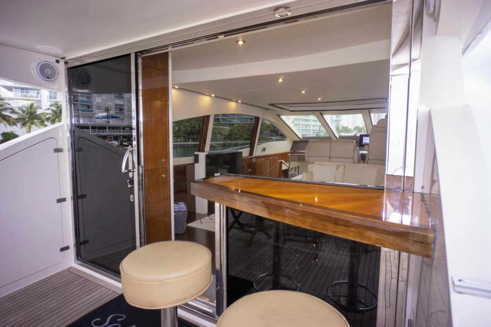 a kitchen with a table and chairs aboard SALACIA Yacht for Sale