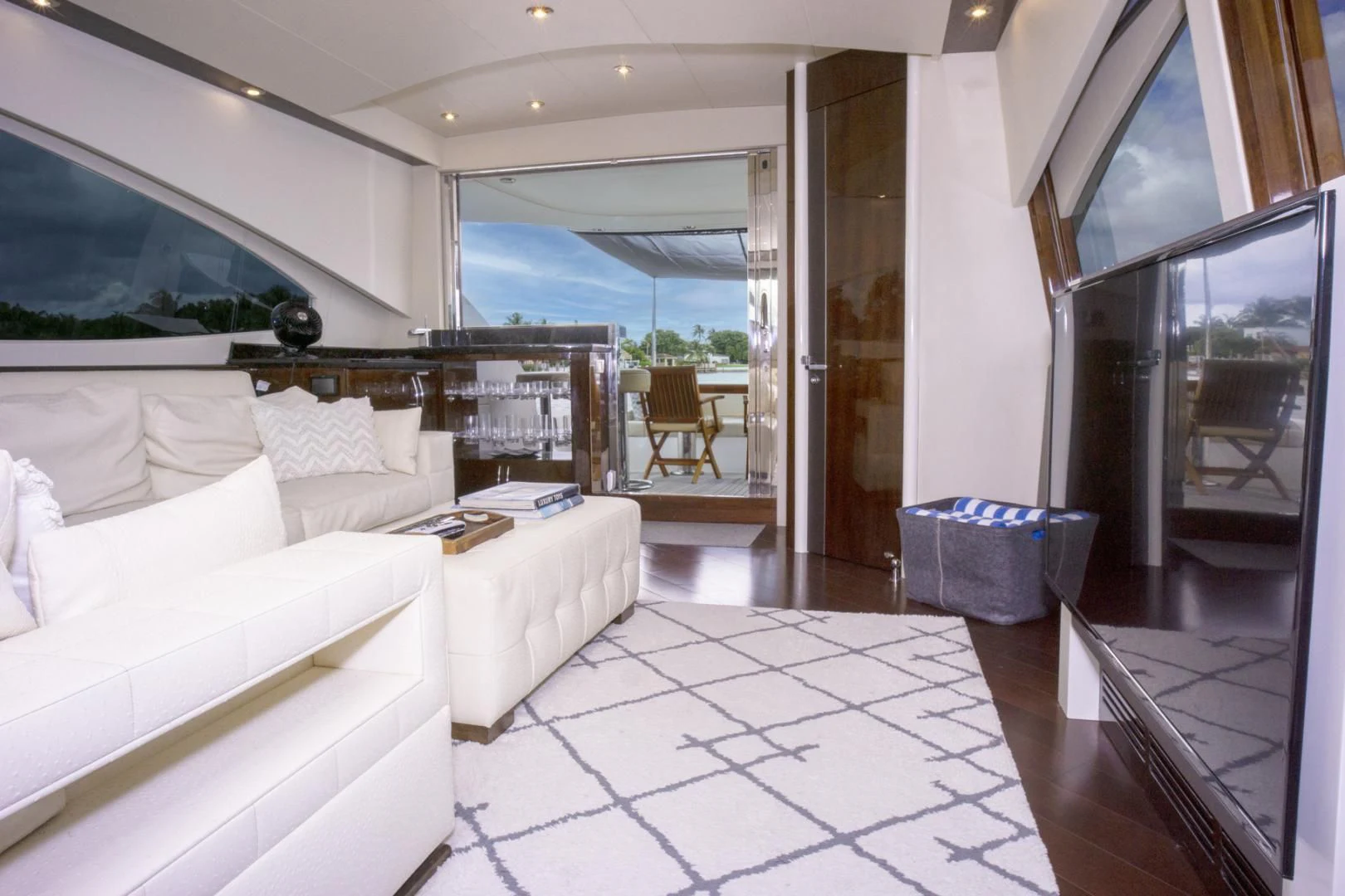 a room with a bed and a table aboard SALACIA Yacht for Sale