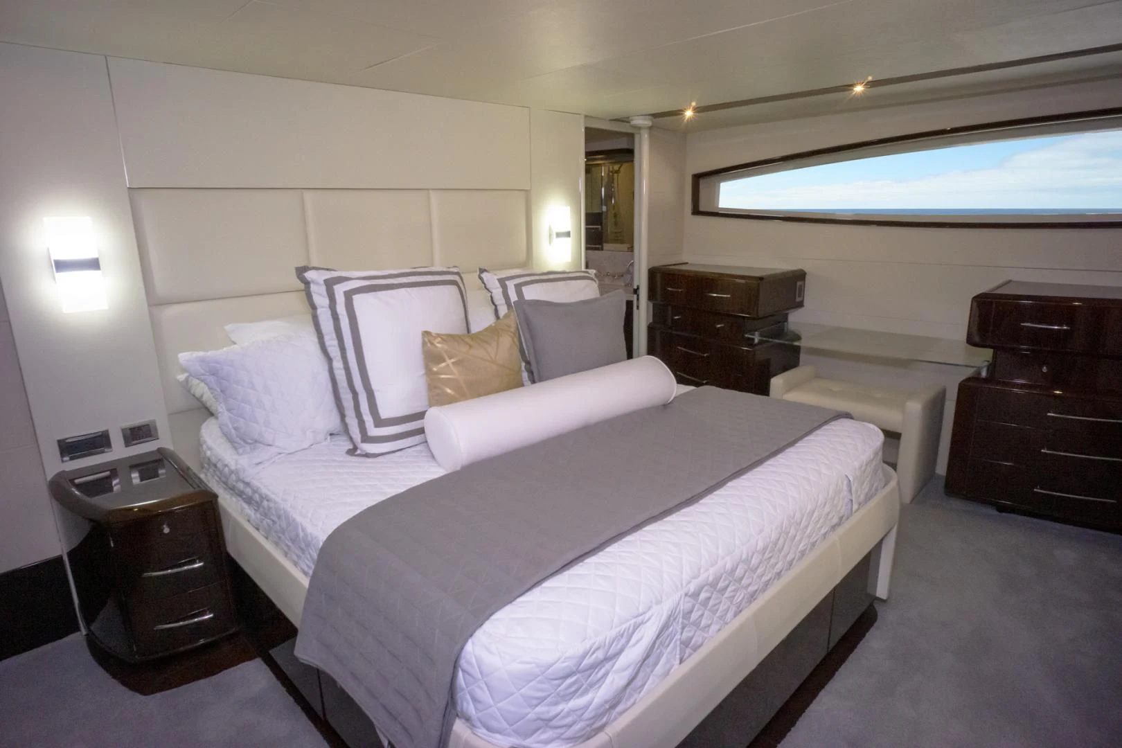 a large bed in a room aboard SALACIA Yacht for Sale