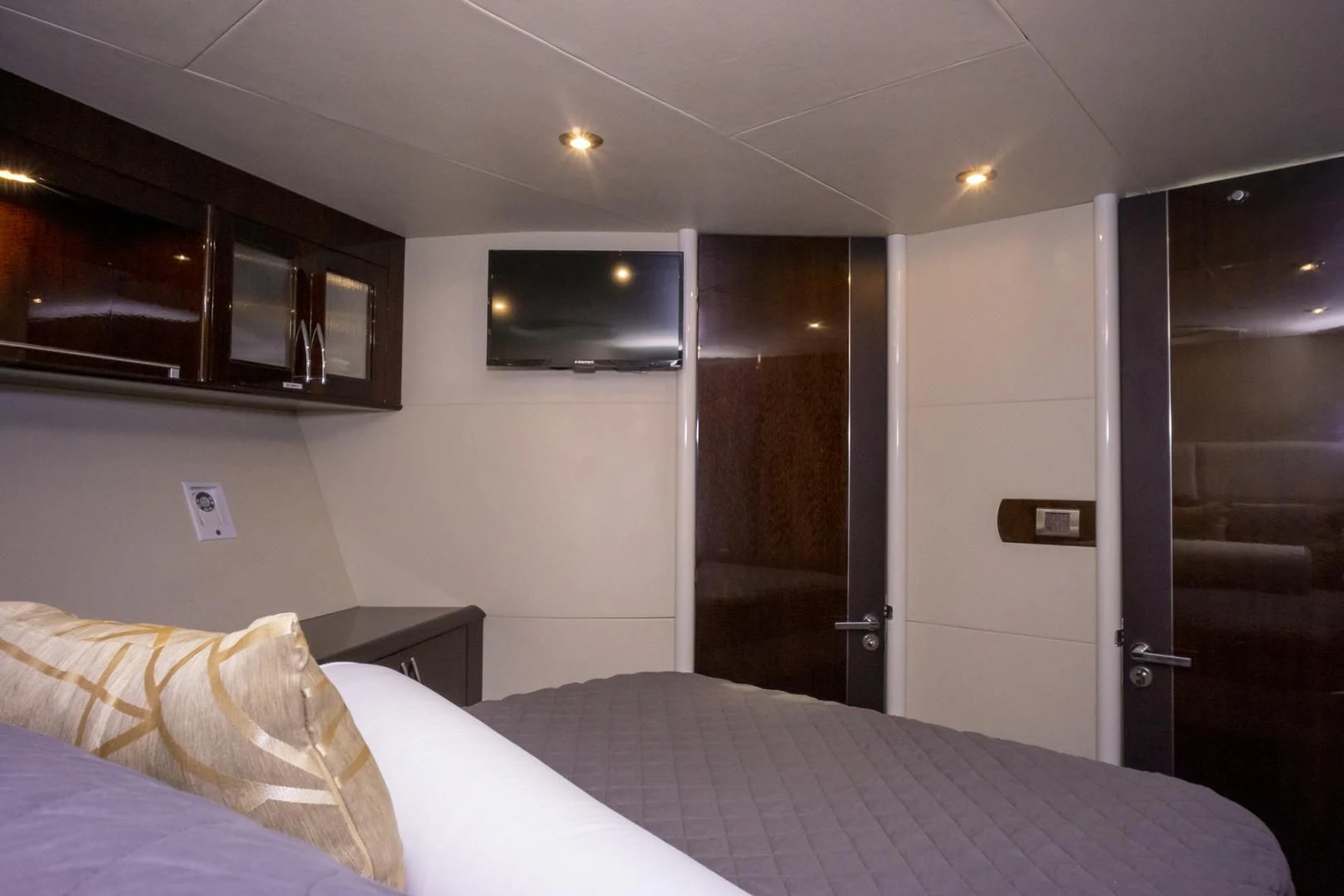 a hotel room with a bed aboard SALACIA Yacht for Sale