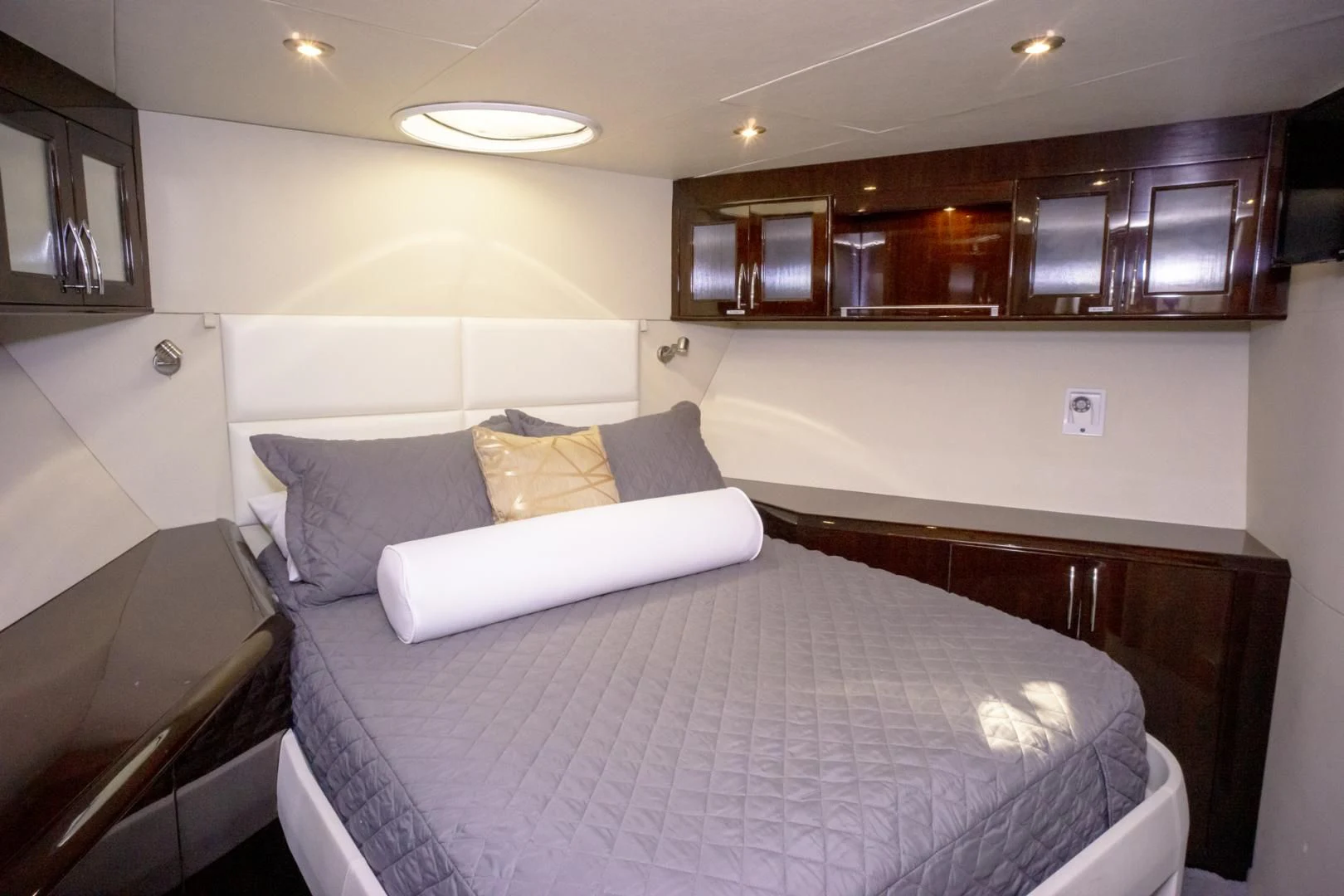 a bed in a room aboard SALACIA Yacht for Sale
