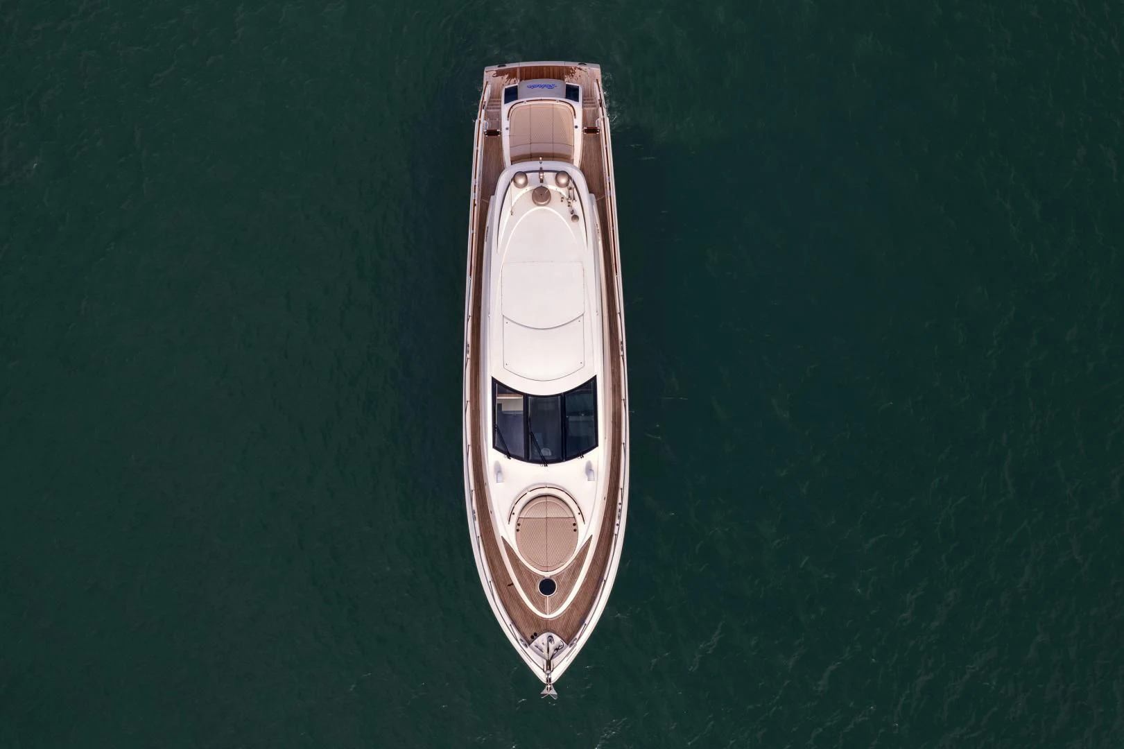 a small white boat aboard SALACIA Yacht for Sale