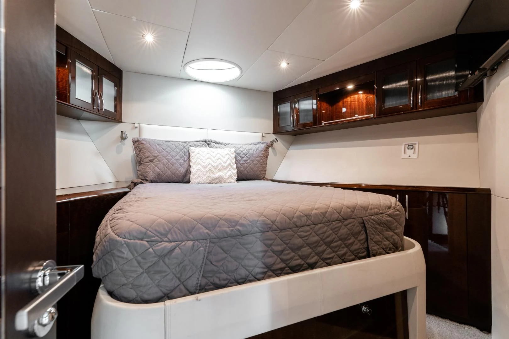 a bed in a room aboard SALACIA Yacht for Sale