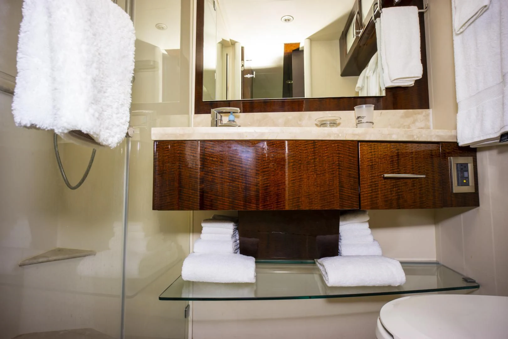 a bathroom with a sink and a mirror aboard SALACIA Yacht for Sale