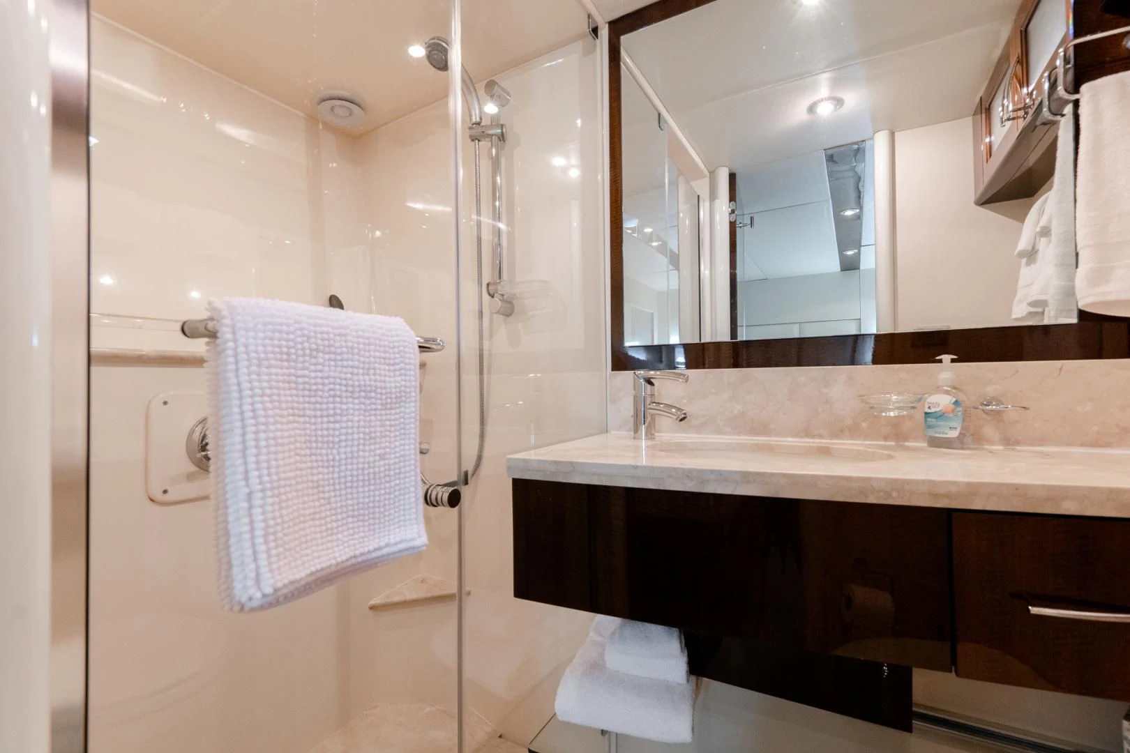 a bathroom with a shower and sink aboard SALACIA Yacht for Sale