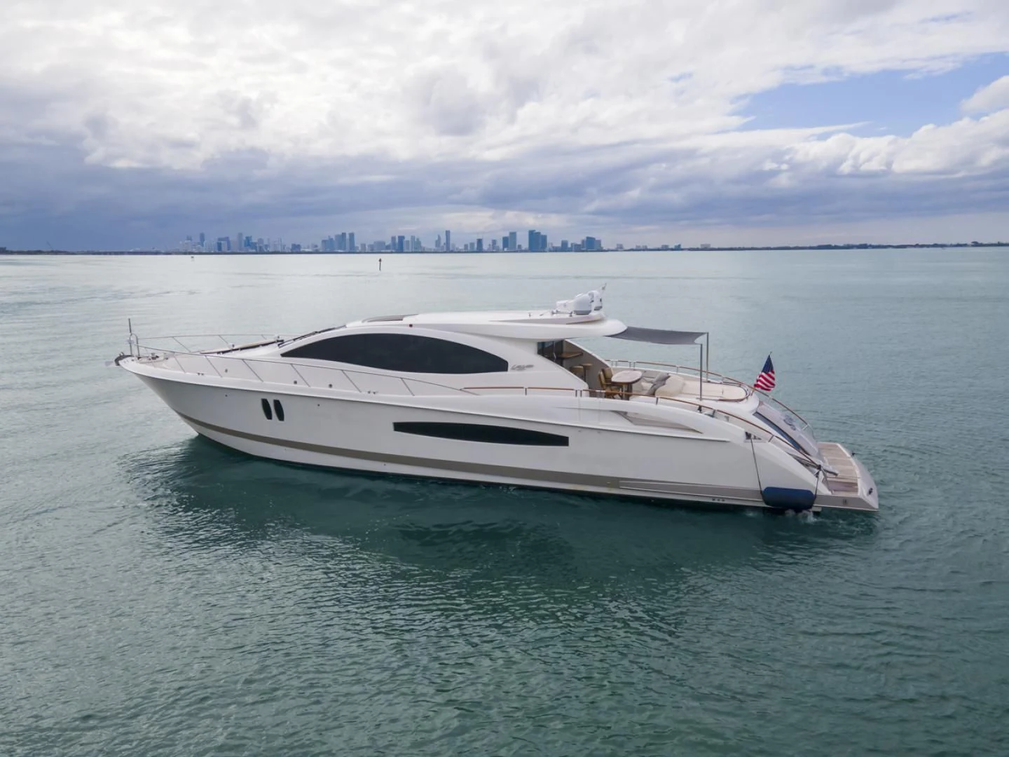 a white boat in the water aboard SALACIA Yacht for Sale