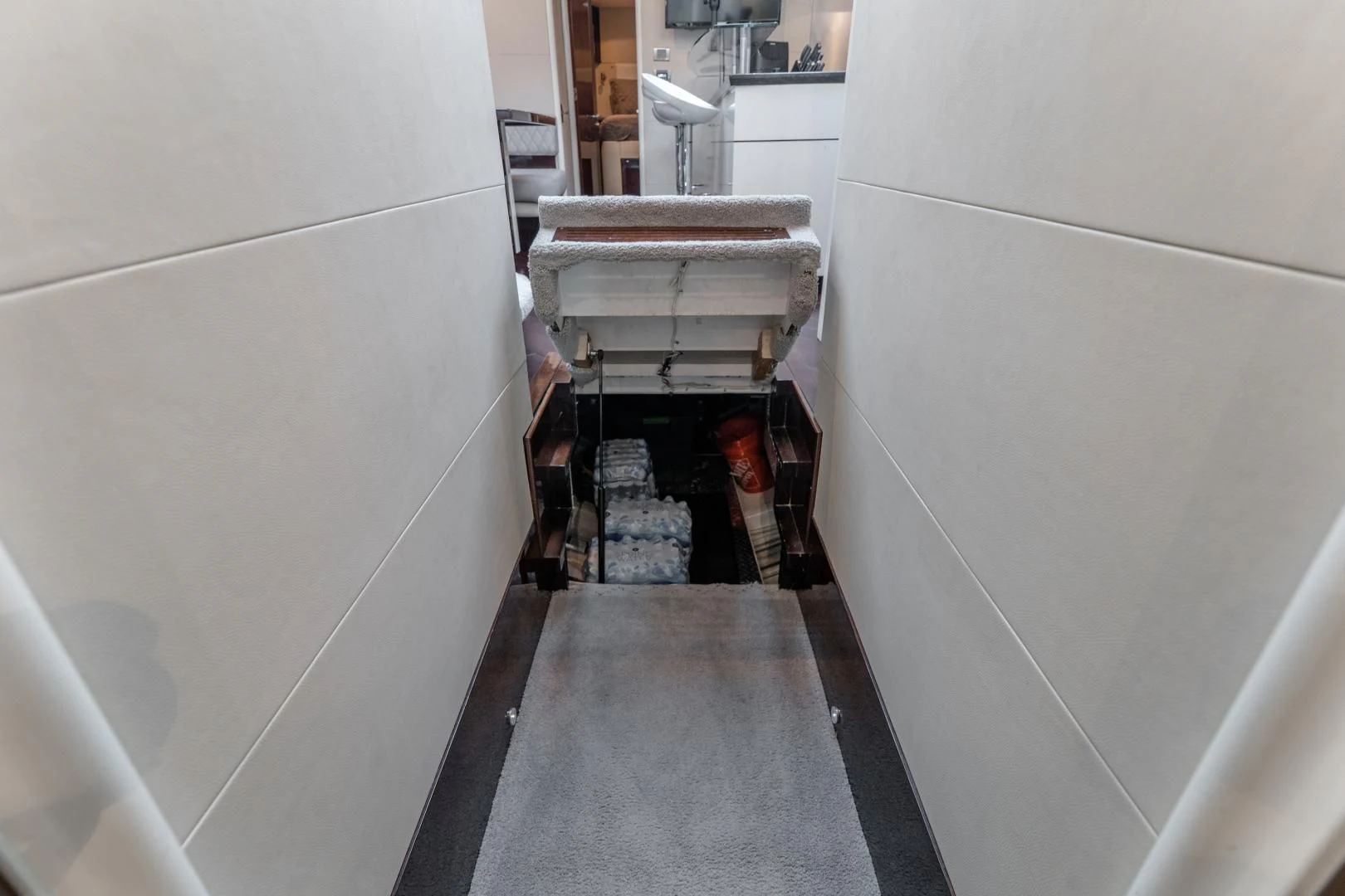 a person standing in a doorway aboard SALACIA Yacht for Sale