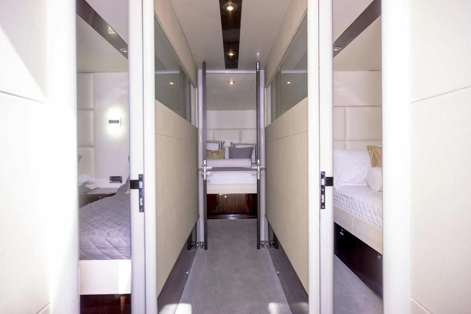 a room with white walls and a bed aboard SALACIA Yacht for Sale