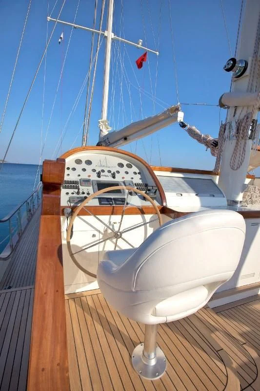 a boat on a deck aboard MISS B Yacht for Sale