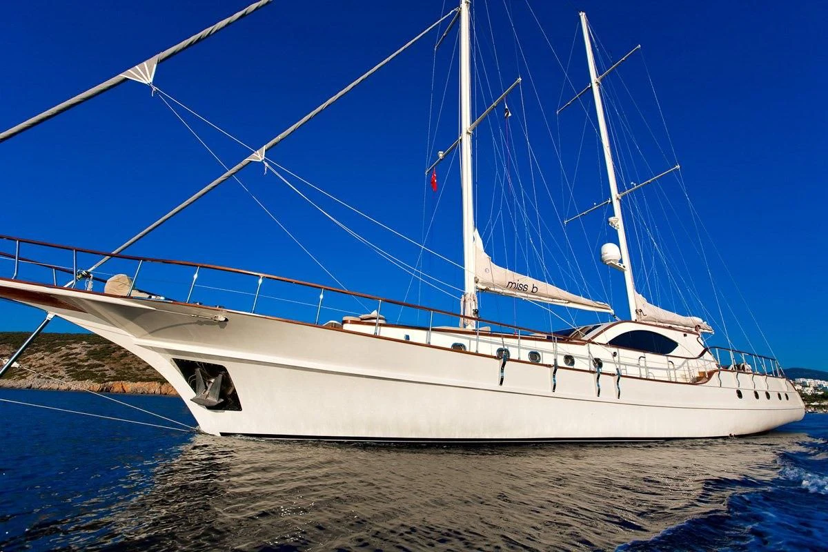 a white yacht on the water aboard MISS B Yacht for Sale
