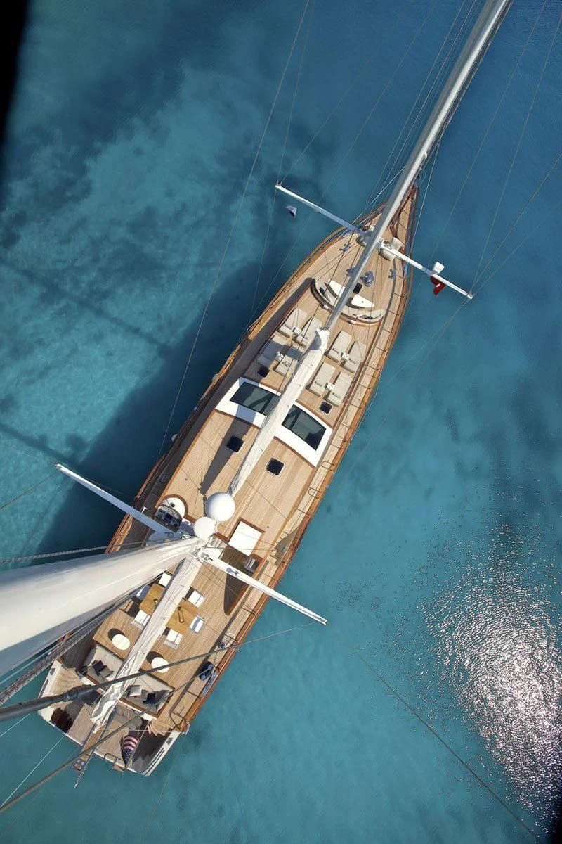 a large ship with a large sail aboard MISS B Yacht for Sale