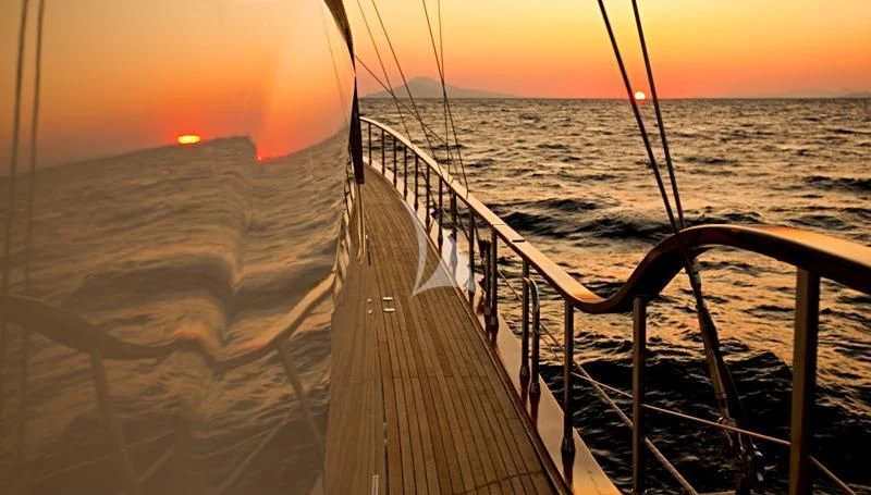 a wooden dock over water aboard MISS B Yacht for Sale