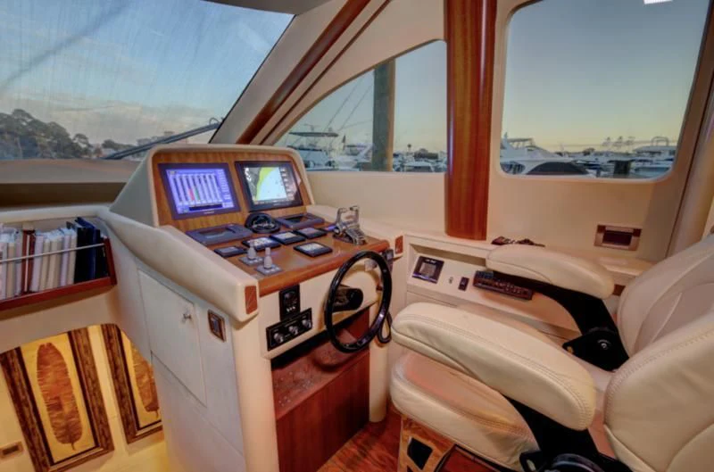 a small airplane with a desk and computer aboard NO RULES Yacht for Sale
