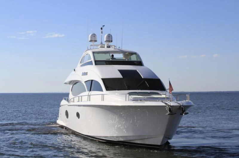 a white yacht in the water aboard NO RULES Yacht for Sale