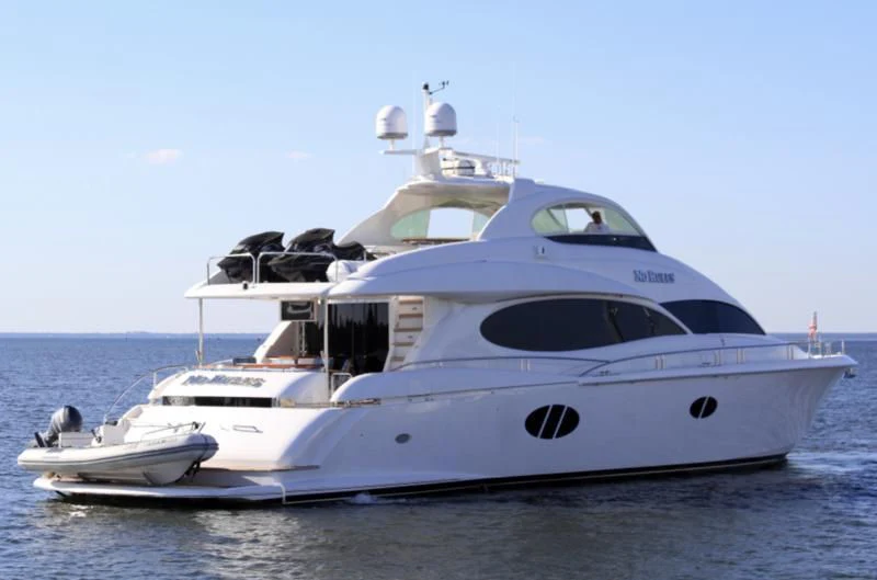 a white yacht on the water aboard NO RULES Yacht for Sale