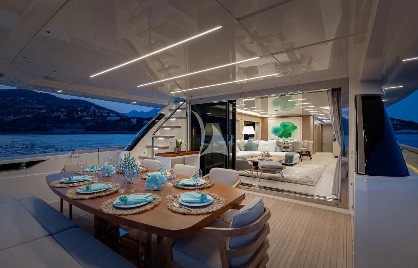 a modern looking living room with a large balcony aboard ALEGRIA II Yacht for Sale